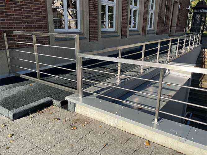 Stainless steel balustrade with handrail and posts from quare steel profile, horizontal rod infill