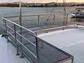 Stainless steel benches on the upper deck of a yacht