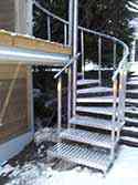 Stainless steel spiral stairs with steps from aluminum sheet.