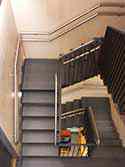 Cheek staircase from painted steel with steps from steel sheet.