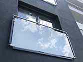 Juliet balconies with stainless steel handrail and posts. Filling from safety glass