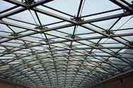 Glass roof with laminated glass panels on steel construction.