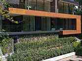 Side jutty and rands of lower and upper terraces cladded with corten panels