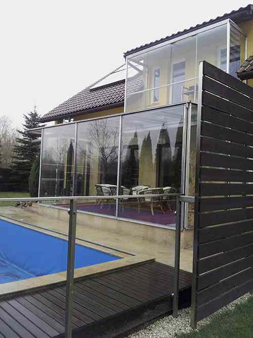 Glass conservatory built on house veranda
