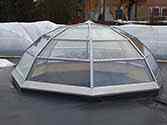 Dome made of safety glass panels installed on stainless steel structure on the roof