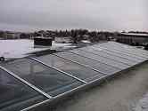 Glass panels installed on top of steel structure