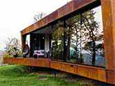 façade cladding with corten steel cassettes on terrace