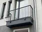 steel balustrade, filling with vertical bars, cladding with aluminum sheet