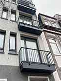 balcony with support structure made of steel profiles, cladding with aluminum sheet, steel railing