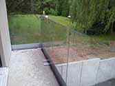 frameless glass balustrade with steel anchors for side mounting