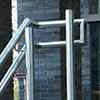double handrail mounted to posts with handrail supports