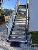 steel staircase, steps from aluminum sheet, stainless steel railing with glass