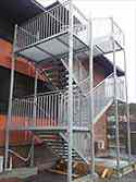 stairs from galvanized steel with steps from steel grid