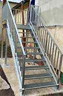 cheek stairs from galvanized steel with steps from steel grid