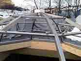 steel support structure put over opening in the roof