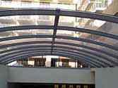 roof over driveway to the underground car park made of polycarbonate plates mounted on steel structure