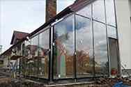 frame of outer walls from stainless steel glazed with safety glass