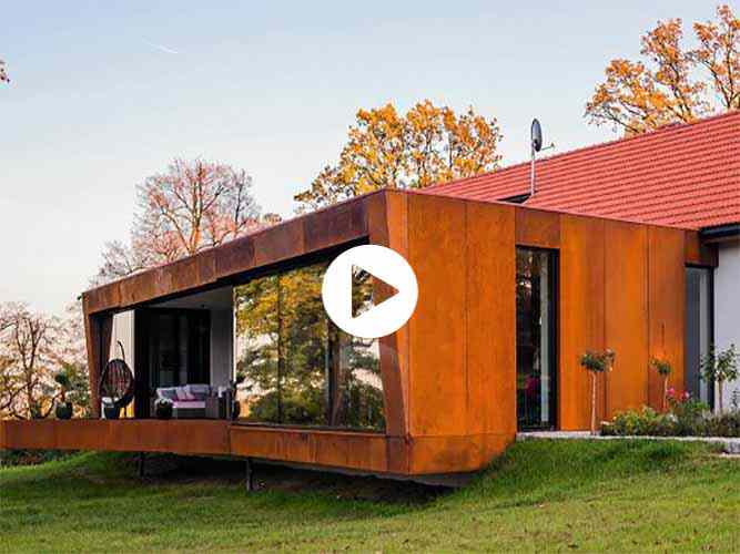 Façade cladding with corten steel cassettes.