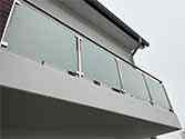 Balcony steel glass railing with stainless handrail and posts