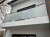 Balcony steel glass railing with stainless handrail and posts