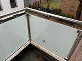 Balcony steel glass balustrade with stainless handrail and posts