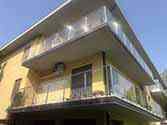 Balcony steel glass railing with stainless handrail and posts