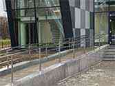 Stainless steel balustrade with double handrail on wheelchair ramp