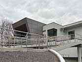 Stainless steel balustrade with horizontal rod infill on stairs